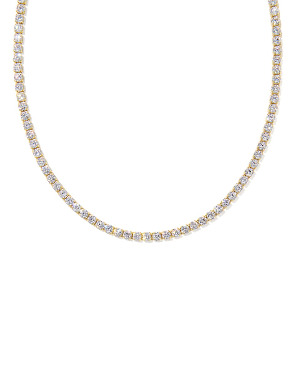 Gold necklace with diamonds on a white background