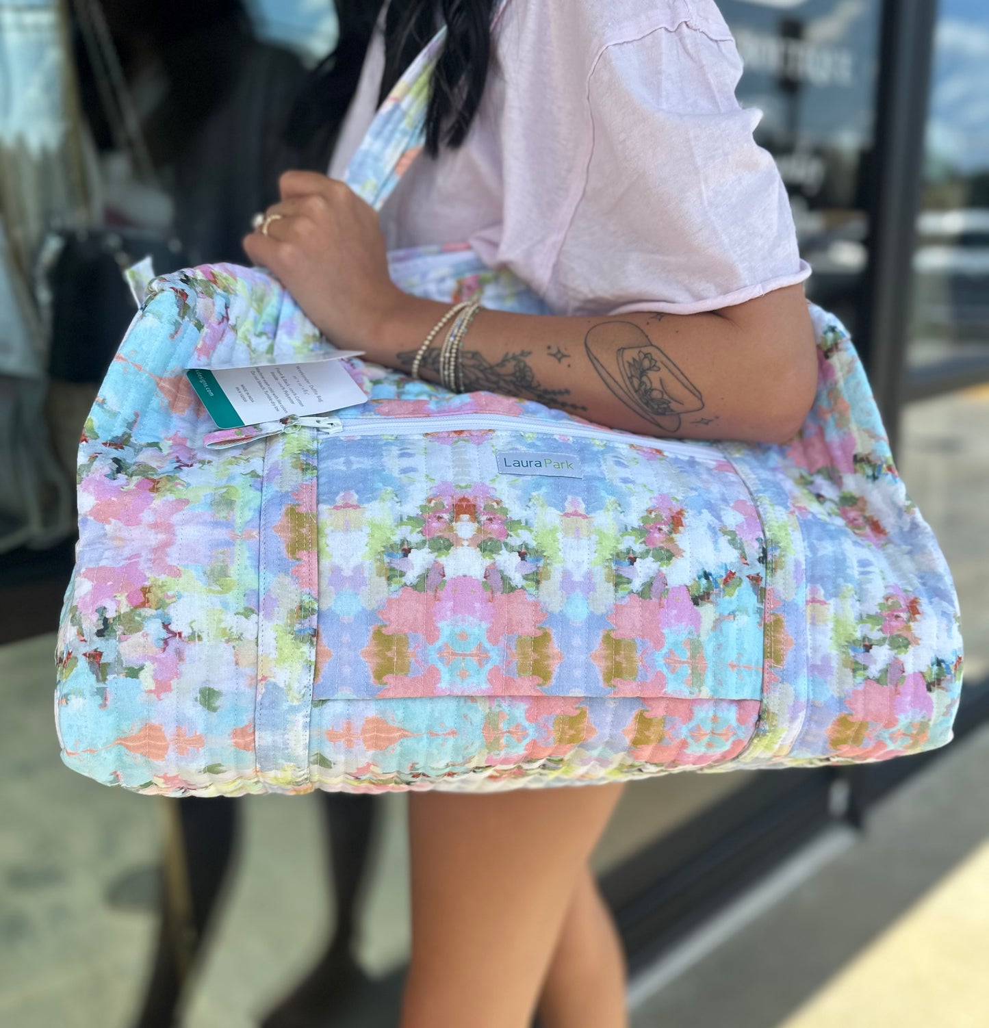 BOUTIQUE LAURA PARK BROOKS AVENUE WEEKENDER DUFFLE BAG ON MODEL