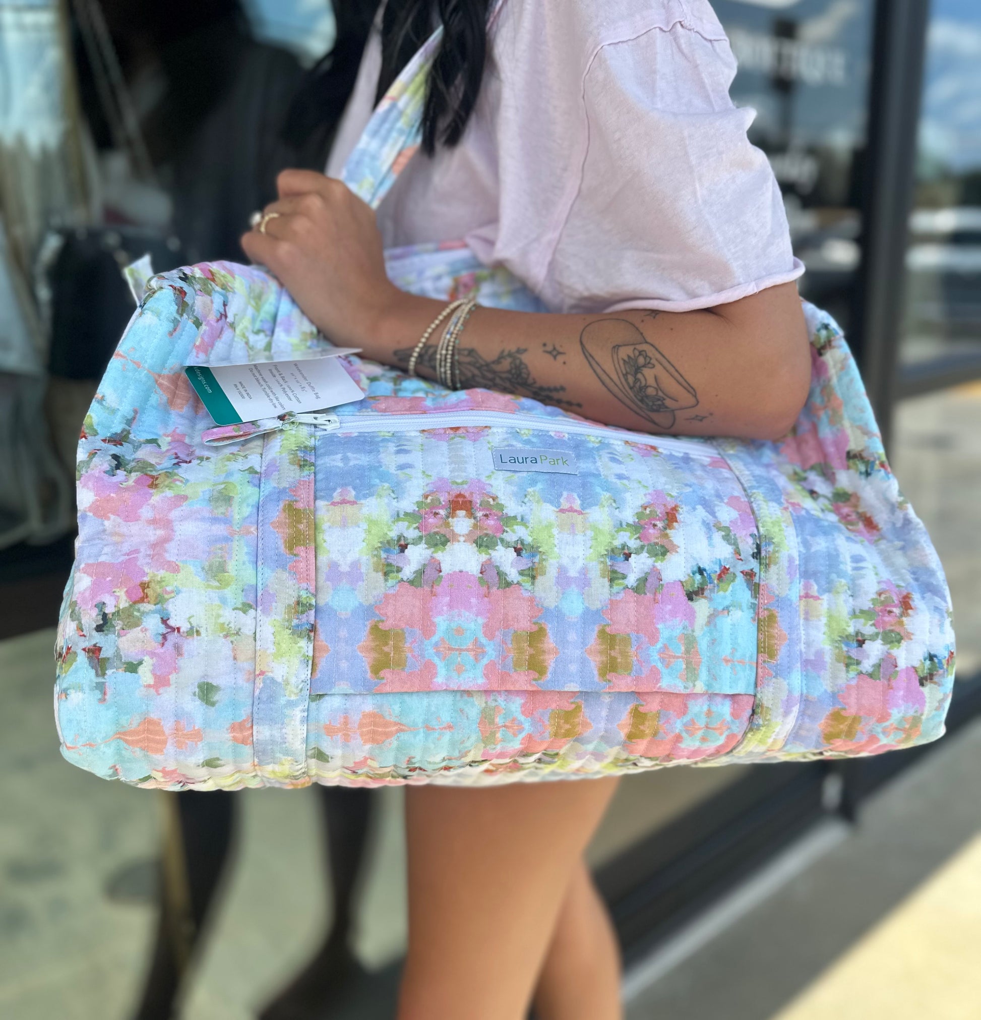 BOUTIQUE LAURA PARK BROOKS AVENUE WEEKENDER DUFFLE BAG ON MODEL