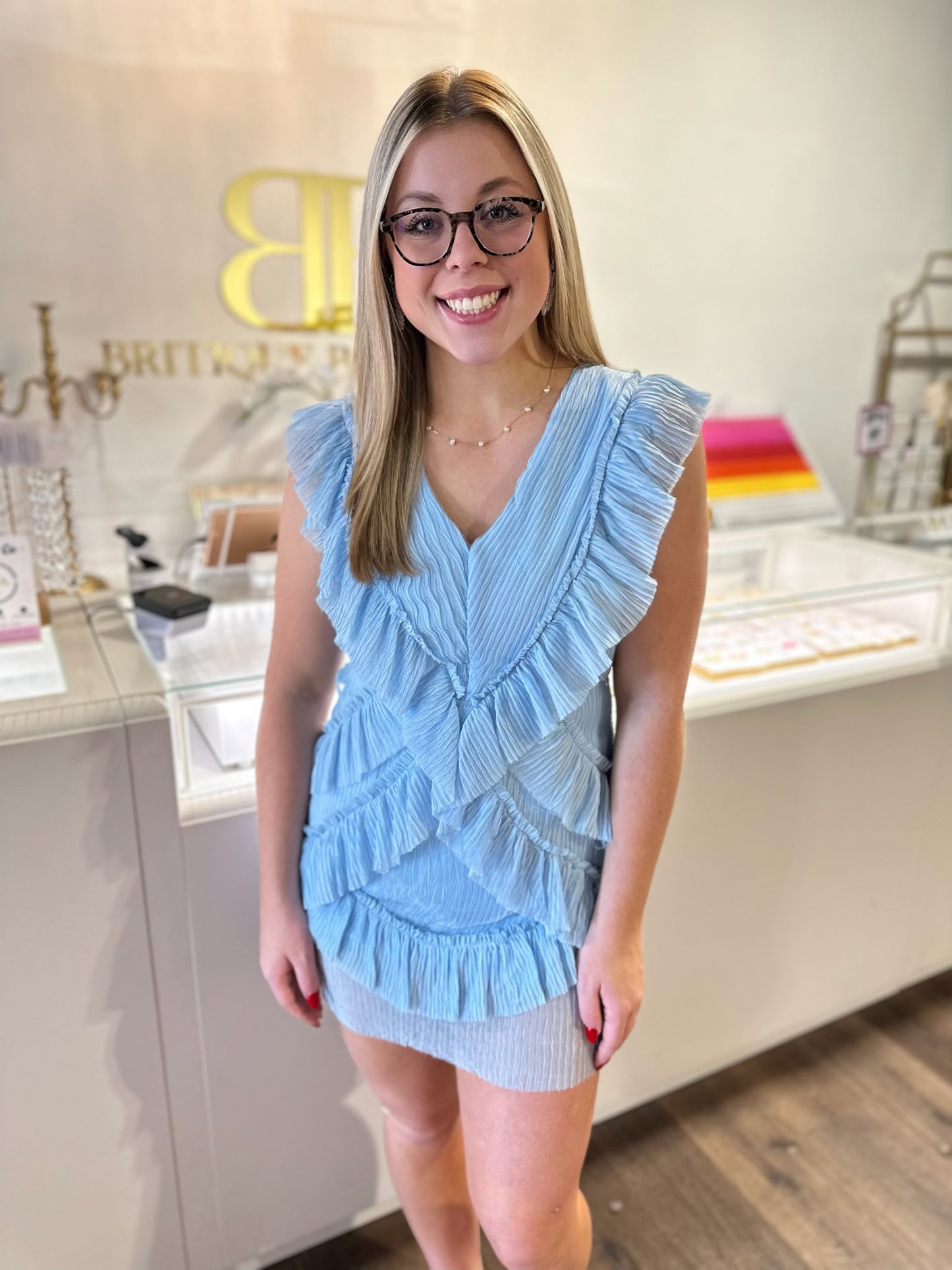 BOUTIQUE RUFFLE CUTOUT BACK MINI DRESS LIGHT BLUE FRONT ON MODEL