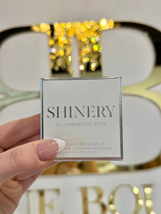 BOUTIQUE SHINERY JEWELRY ILLUMINATING POM TARNISH ERASER IN HAND