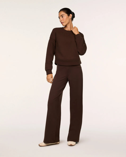 Model in SPANX® BoostUp Cotton Fleece Crewneck - Umber Root with white background