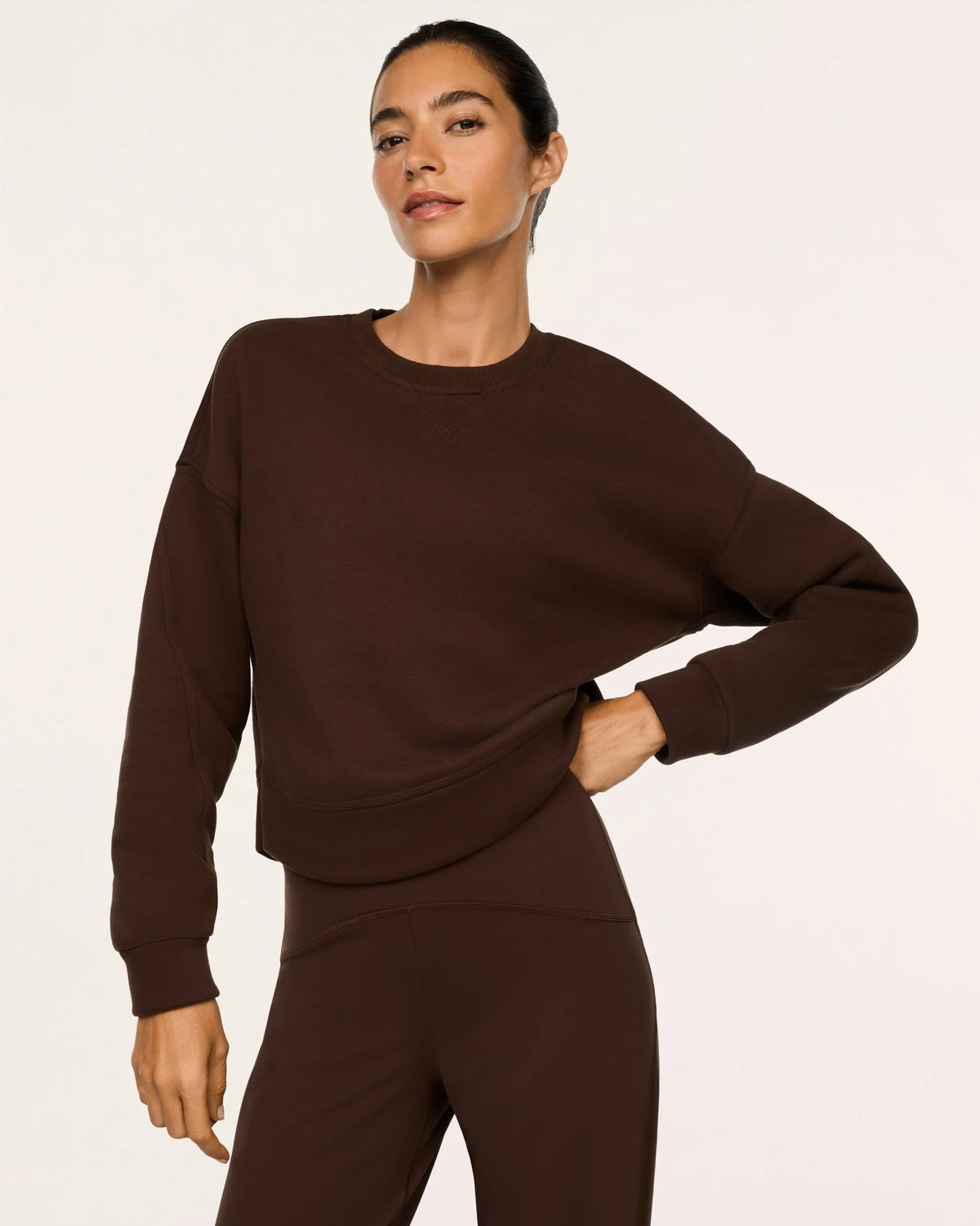 Model wearing SPANX® BoostUp Cotton Fleece Crewneck - Umber Root