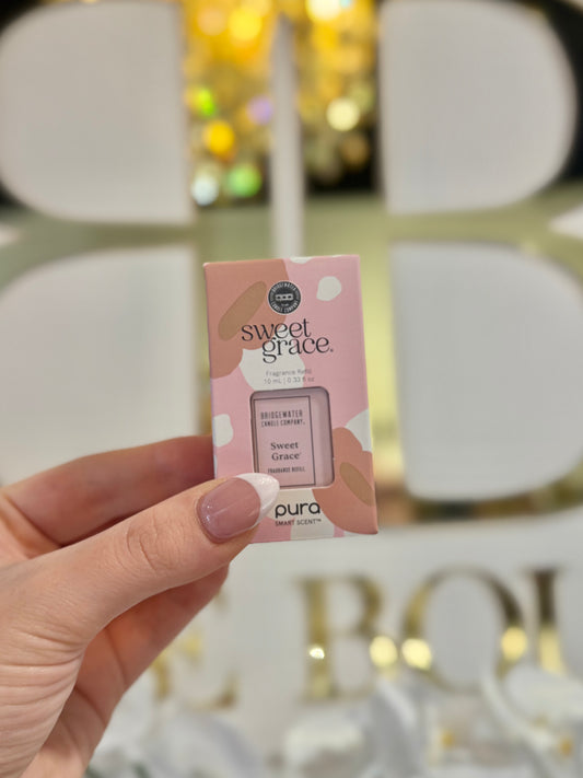 BOUTIQUE SWEET GRACE PURA DIFFUSER VIAL IN HAND