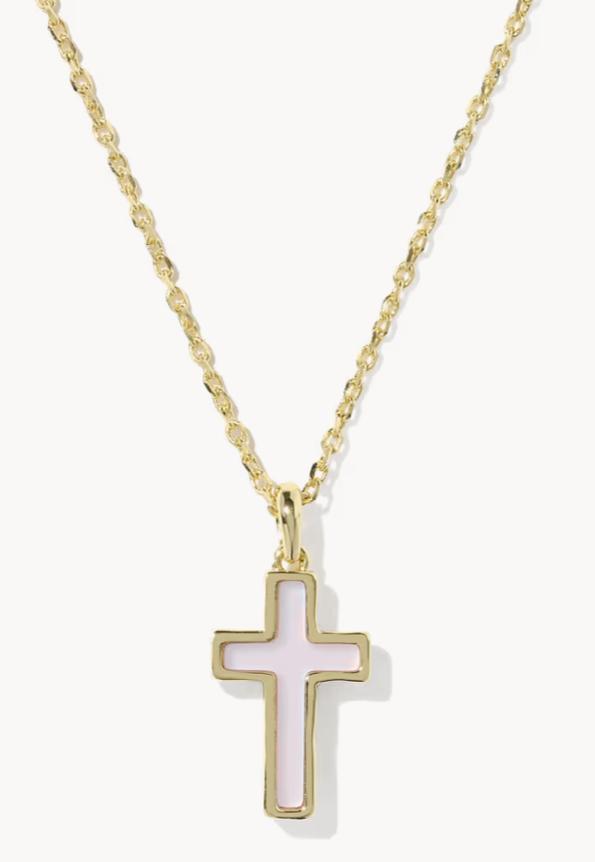 Gold cross pendant necklace on a white background