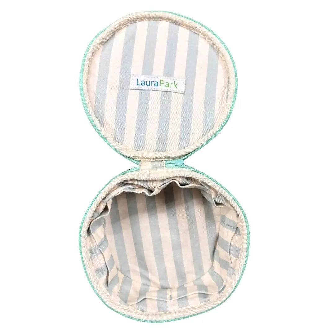 Striped jewelry Laura Park branded case on a white background