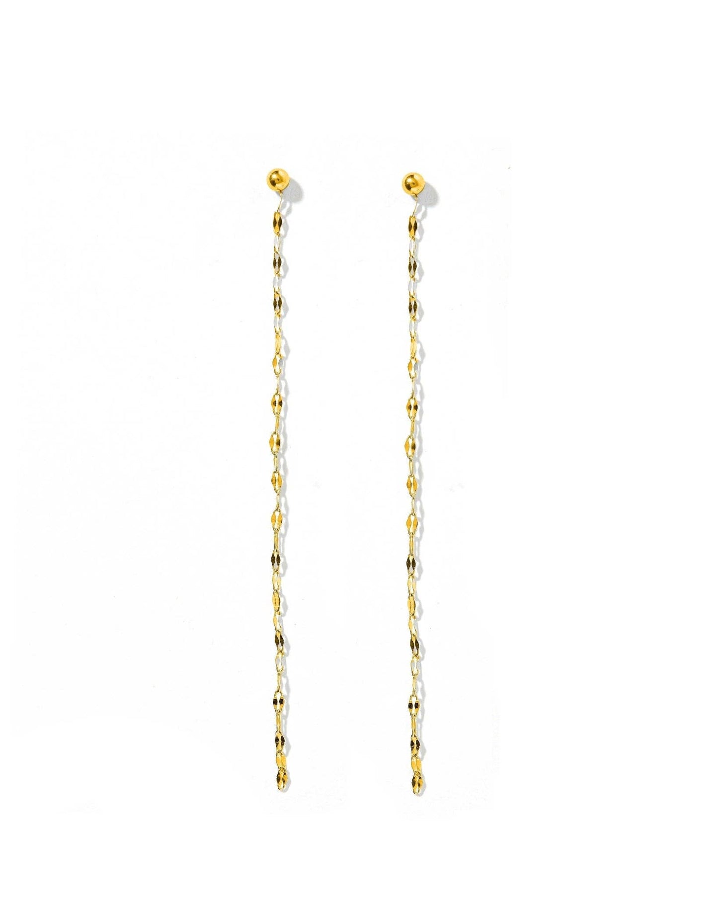 Gold chain earrings on a white background