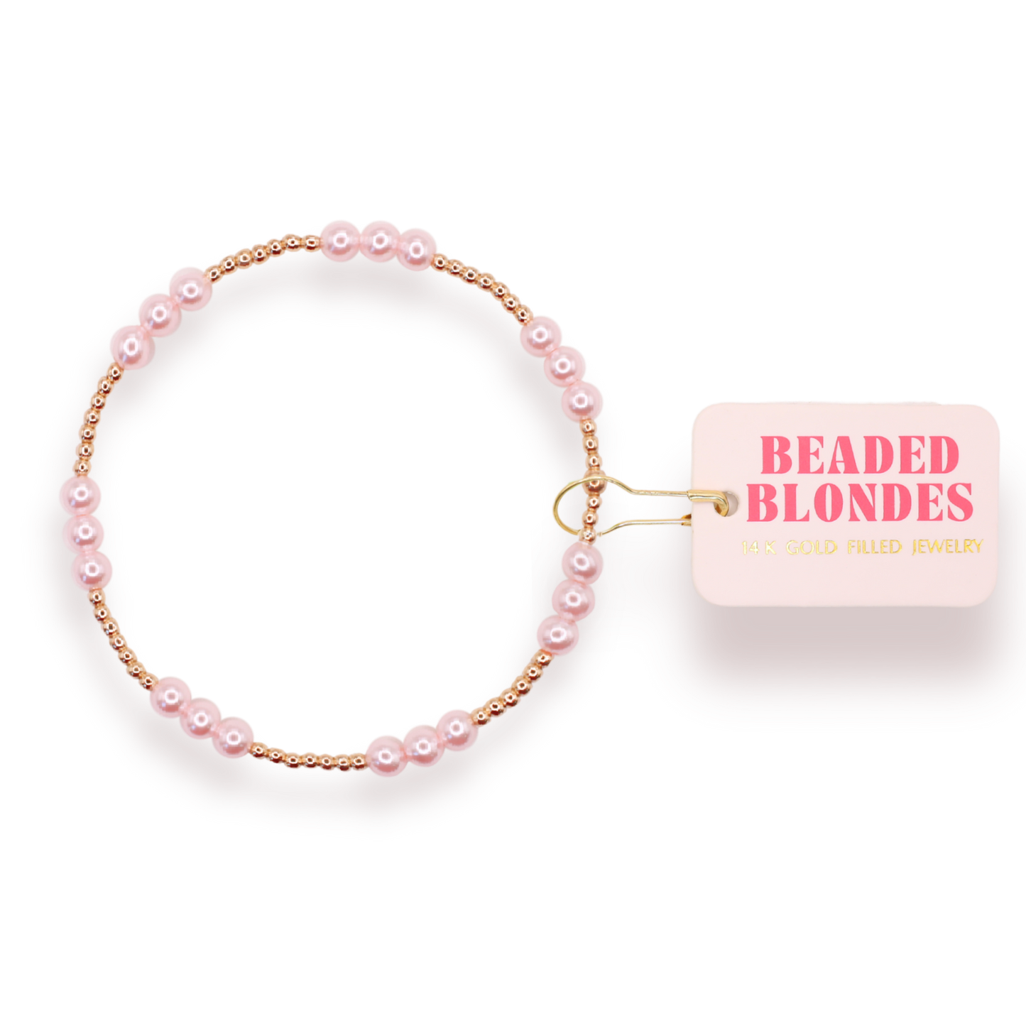 Beaded bracelet with pink pearls and gold accents on a clear background, featuring 'Beaded Blondes' brand tag.