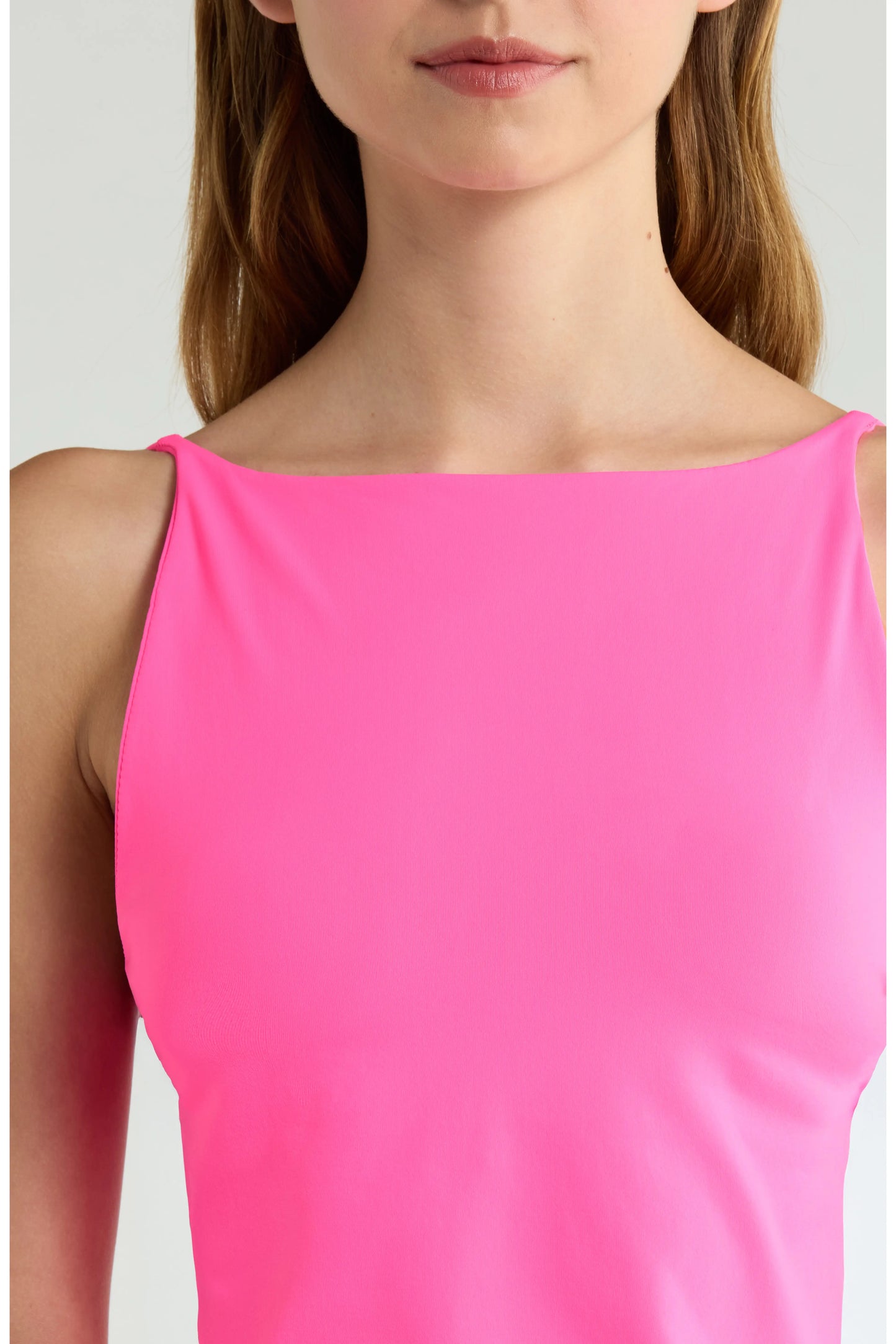Britique Boutique model wearing Free People Hummingbird Pink Top showing neck line