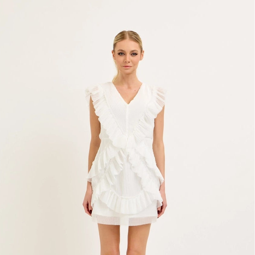 Model wearing white boutique bridal lace mini dress