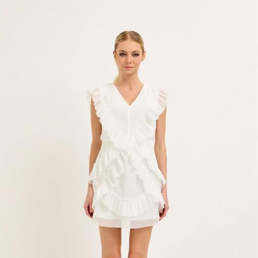 Model wearing white boutique bridal lace mini dress