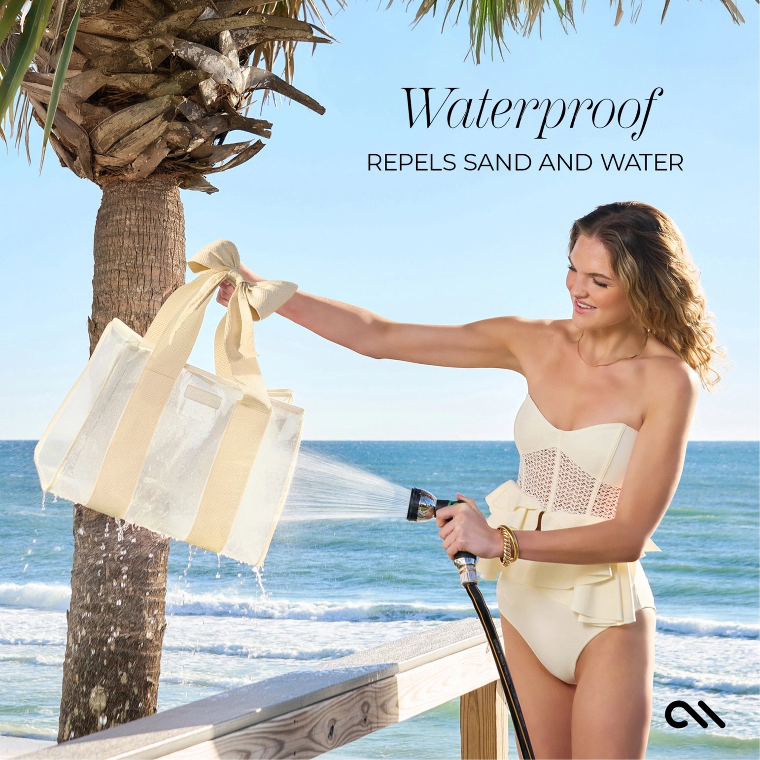 Woman in a swimsuit holding a beige tote bag on a beach with text about the bag's waterproof properties.