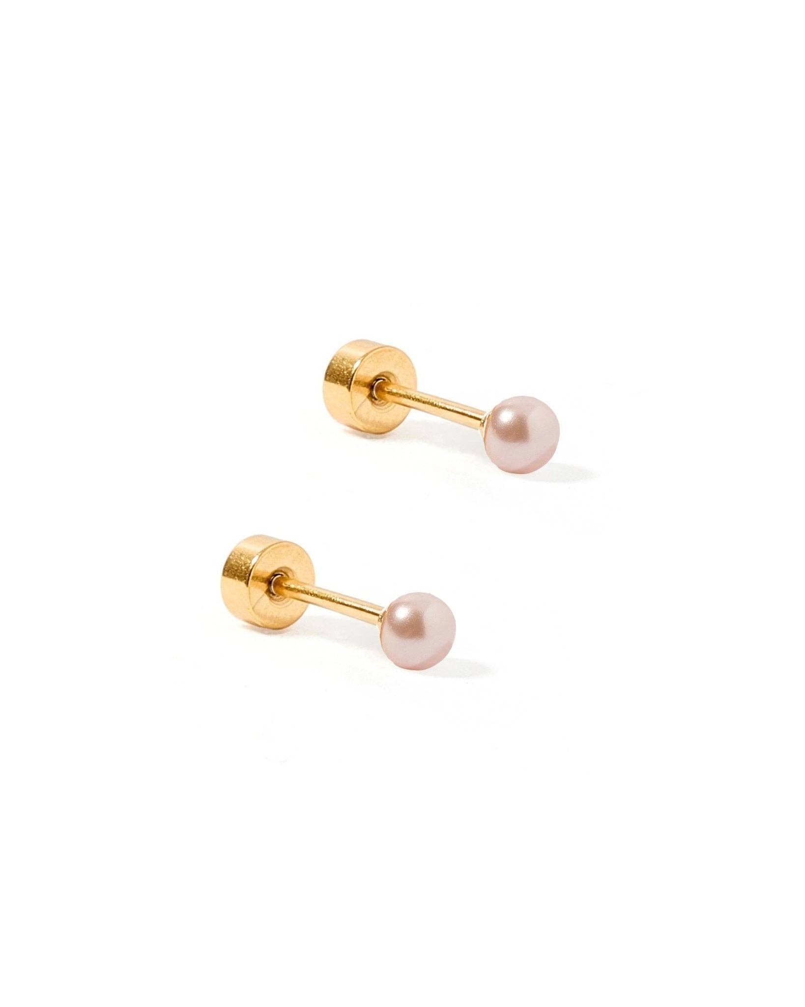 Pair of gold earrings with pink pearls on a white background