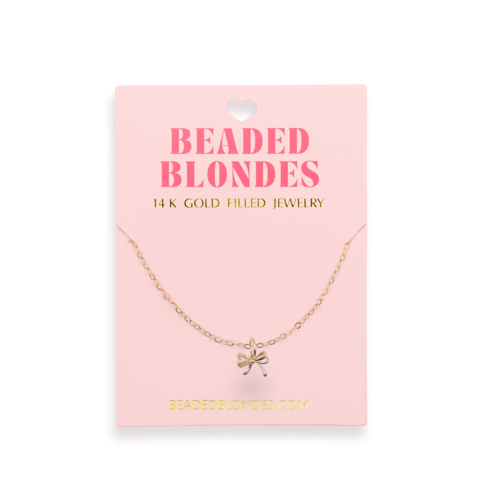 Gold necklace on a pink card with 'Beaded Blondes' branding