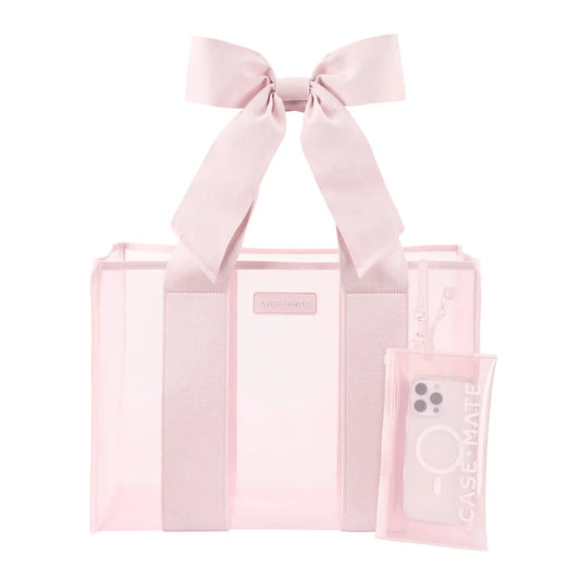 Pink tote bag with a bow and a matching pouch on a white background