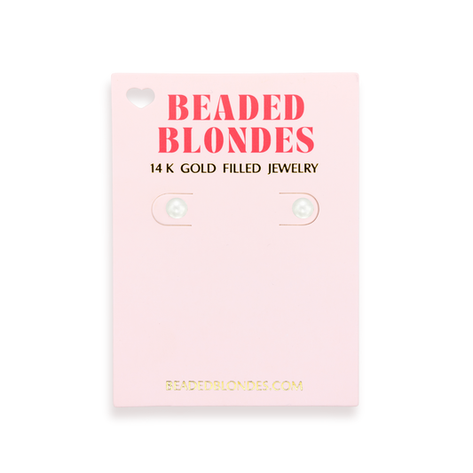 Beaded Blondes jewelry card with pink background and gold text
