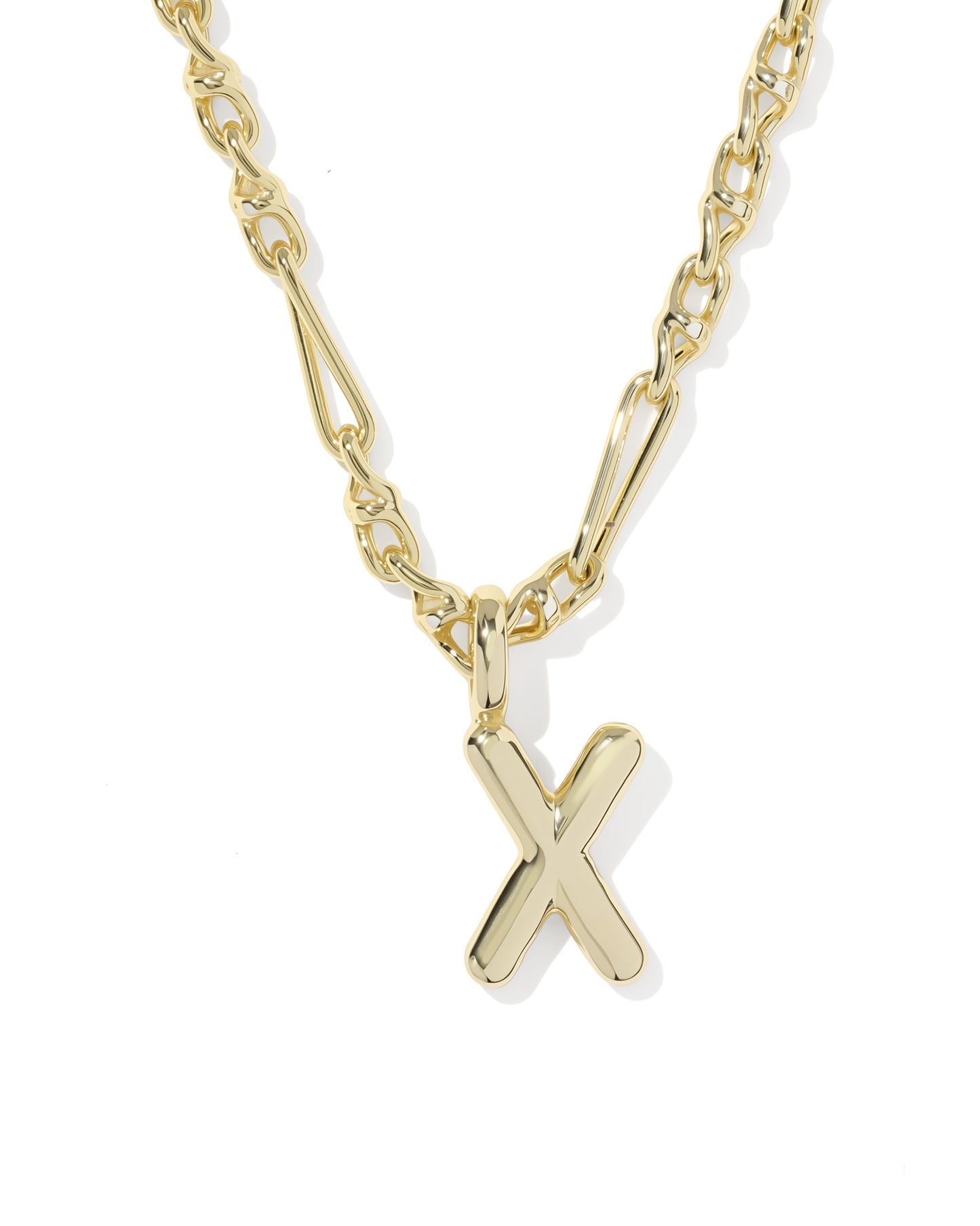 Gold necklace with a 'X' pendant on a white background
