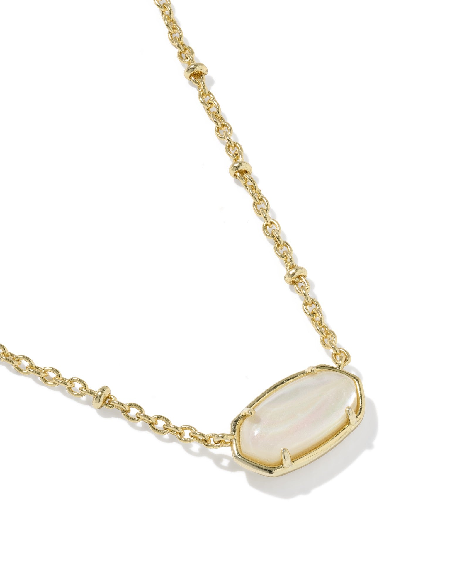 Gold necklace with a large, oval-shaped, light-colored gemstone on a white background