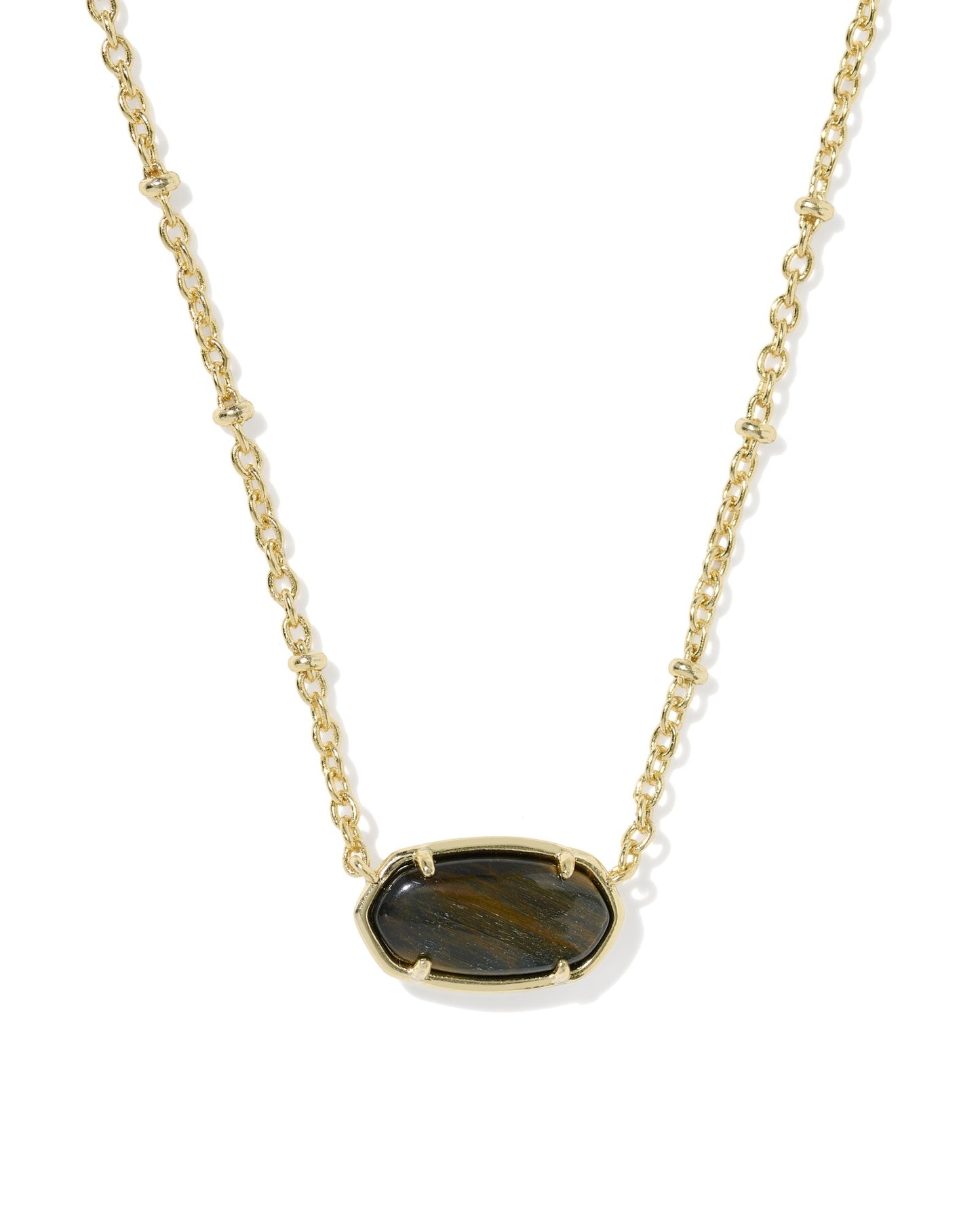gold necklace with black pendant on a white background 