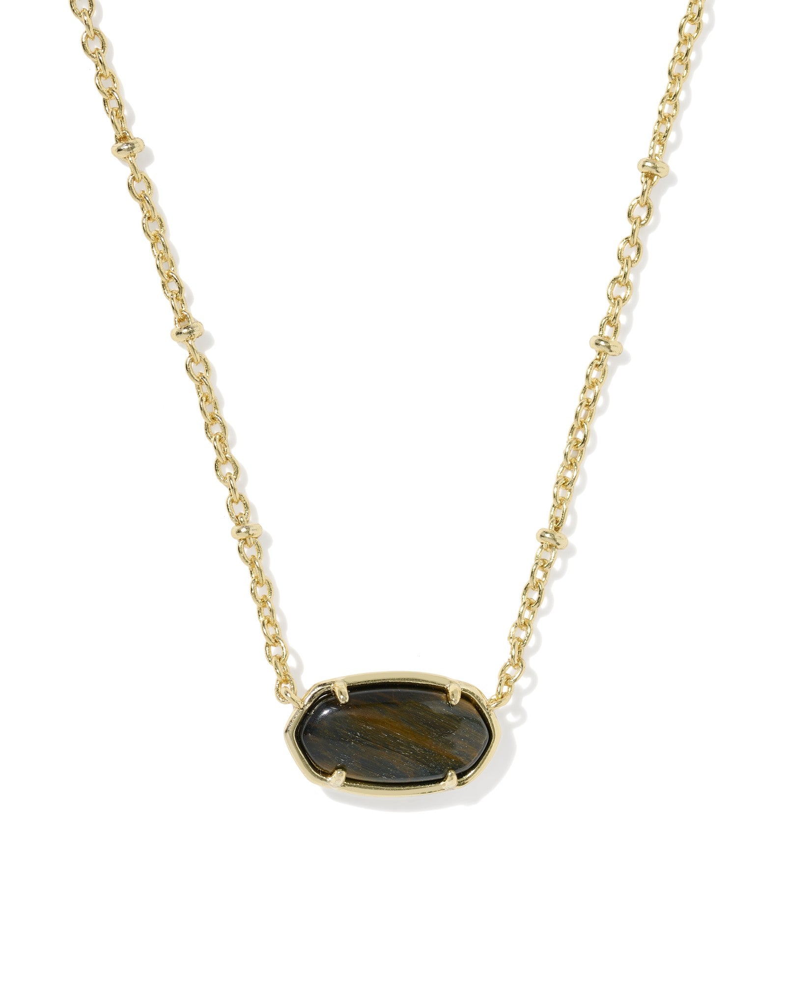 gold necklace with black pendant on a white background 
