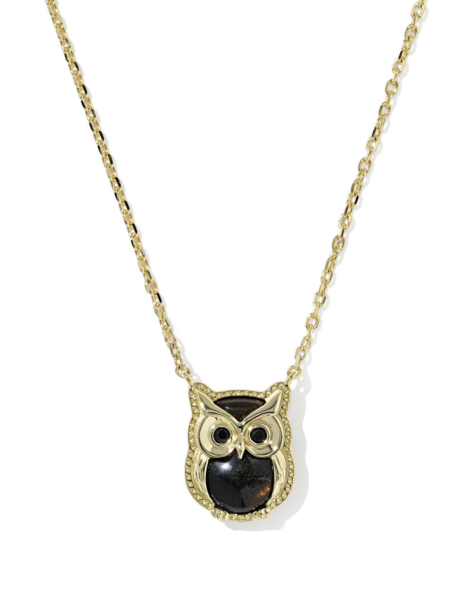 Gold owl-shaped pendant necklace on a white background