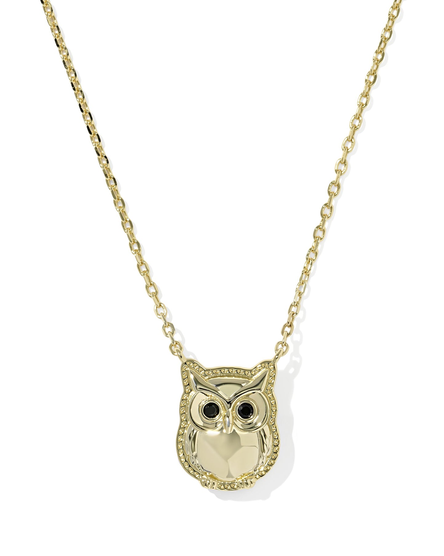 Gold owl-shaped pendant on a chain against a white background