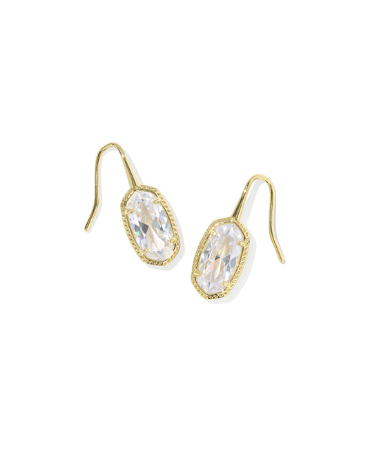 Kendra scott gold drop earrings with clear pendant on white background 