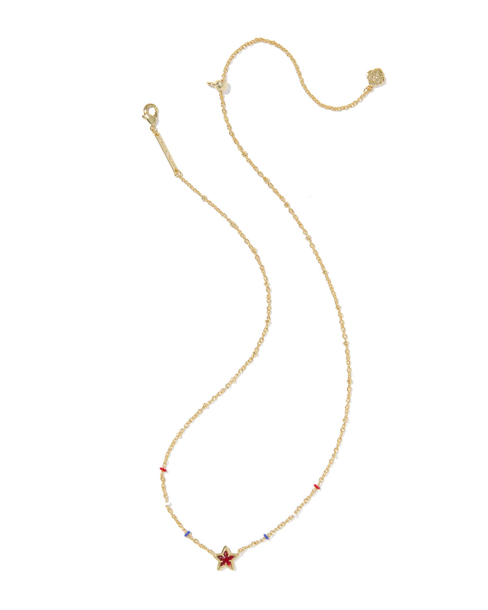 Gold necklace with starfish pendant on a white background