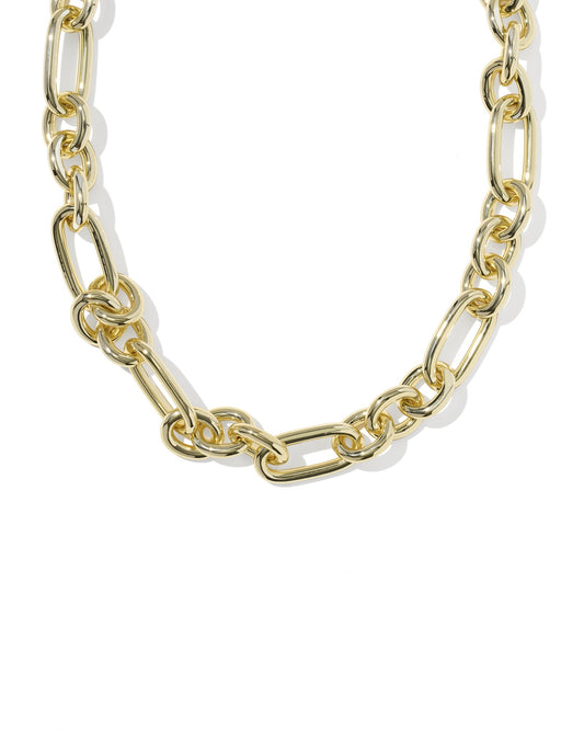 gold chunky chain necklace close up on white background 