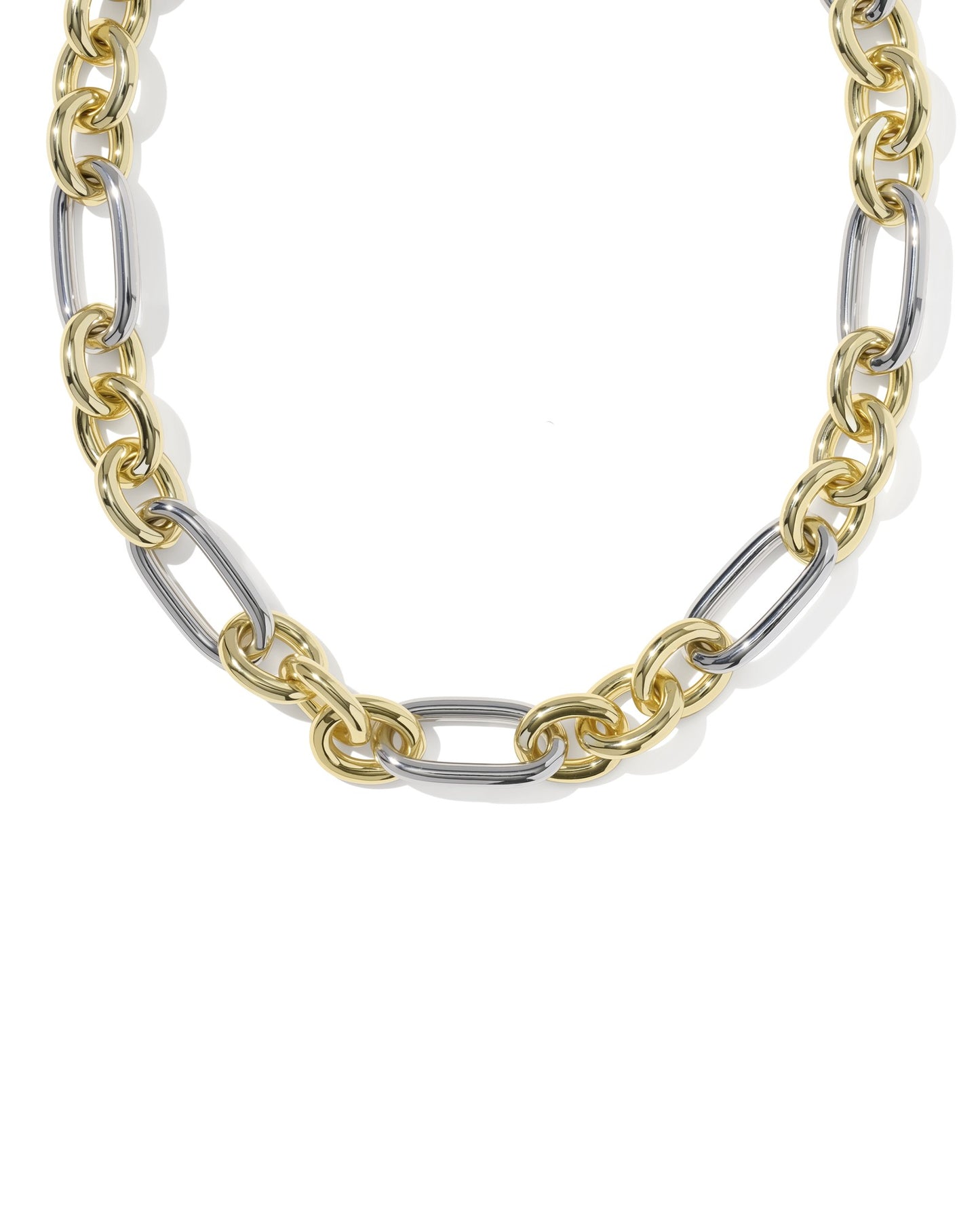 gold and silver chunky chain necklace close up on white background 