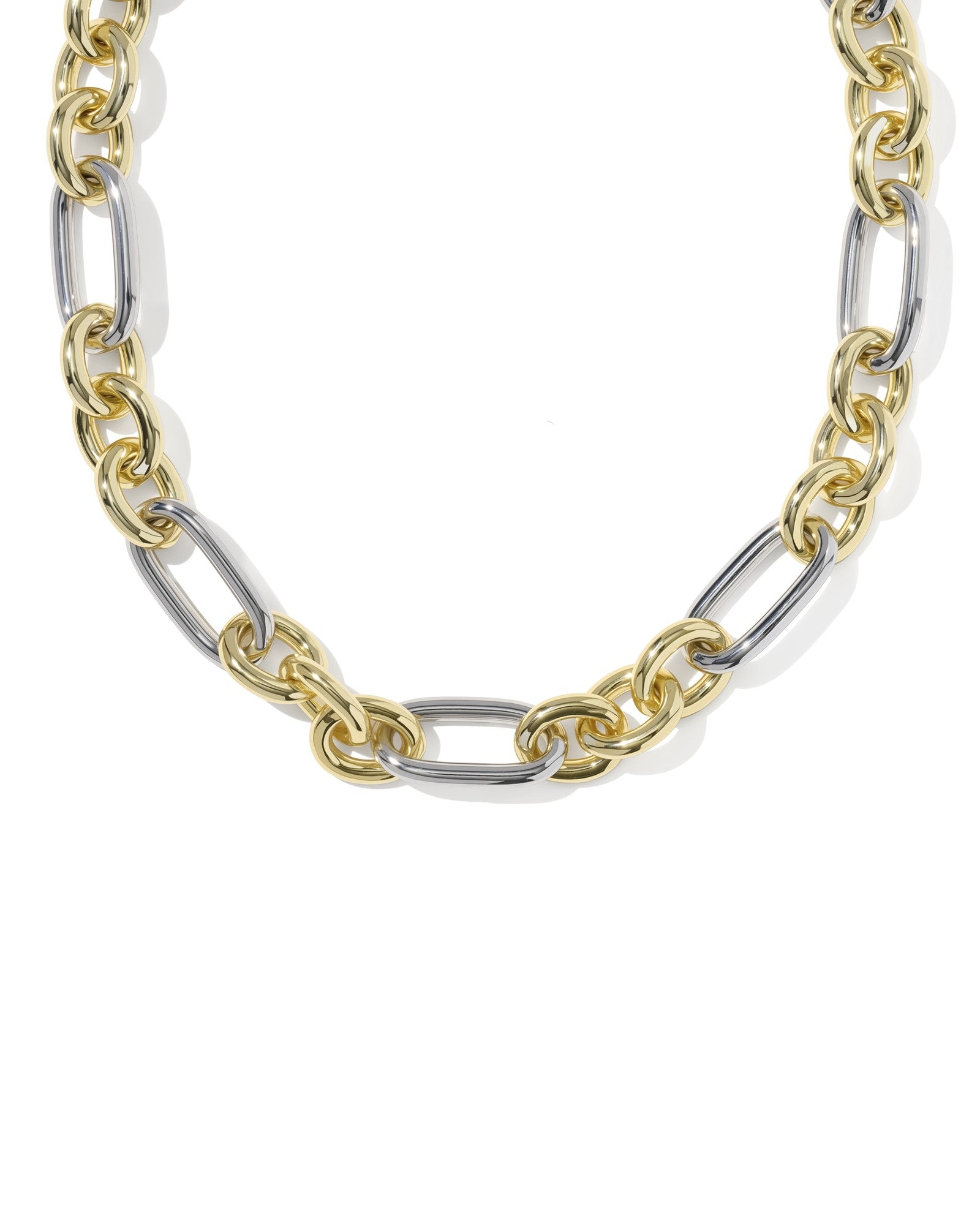 gold and silver chunky chain necklace close up on white background 