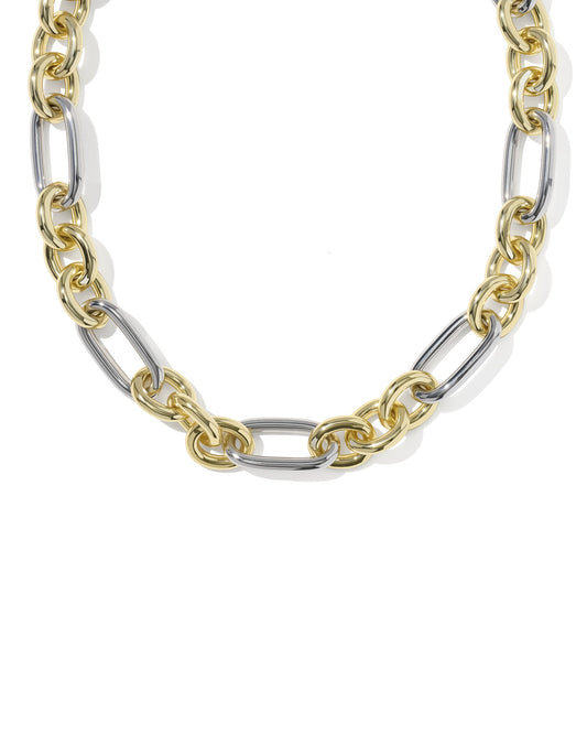 gold and silver chunky chain necklace close up on white background 