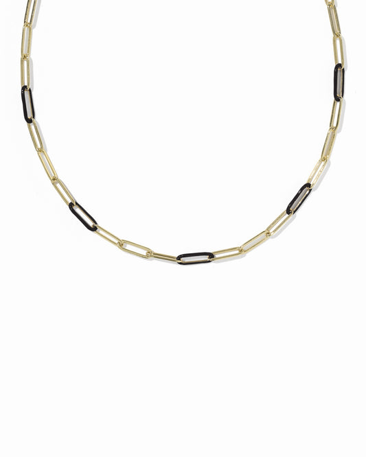 Gold chain with black and gold links on white background