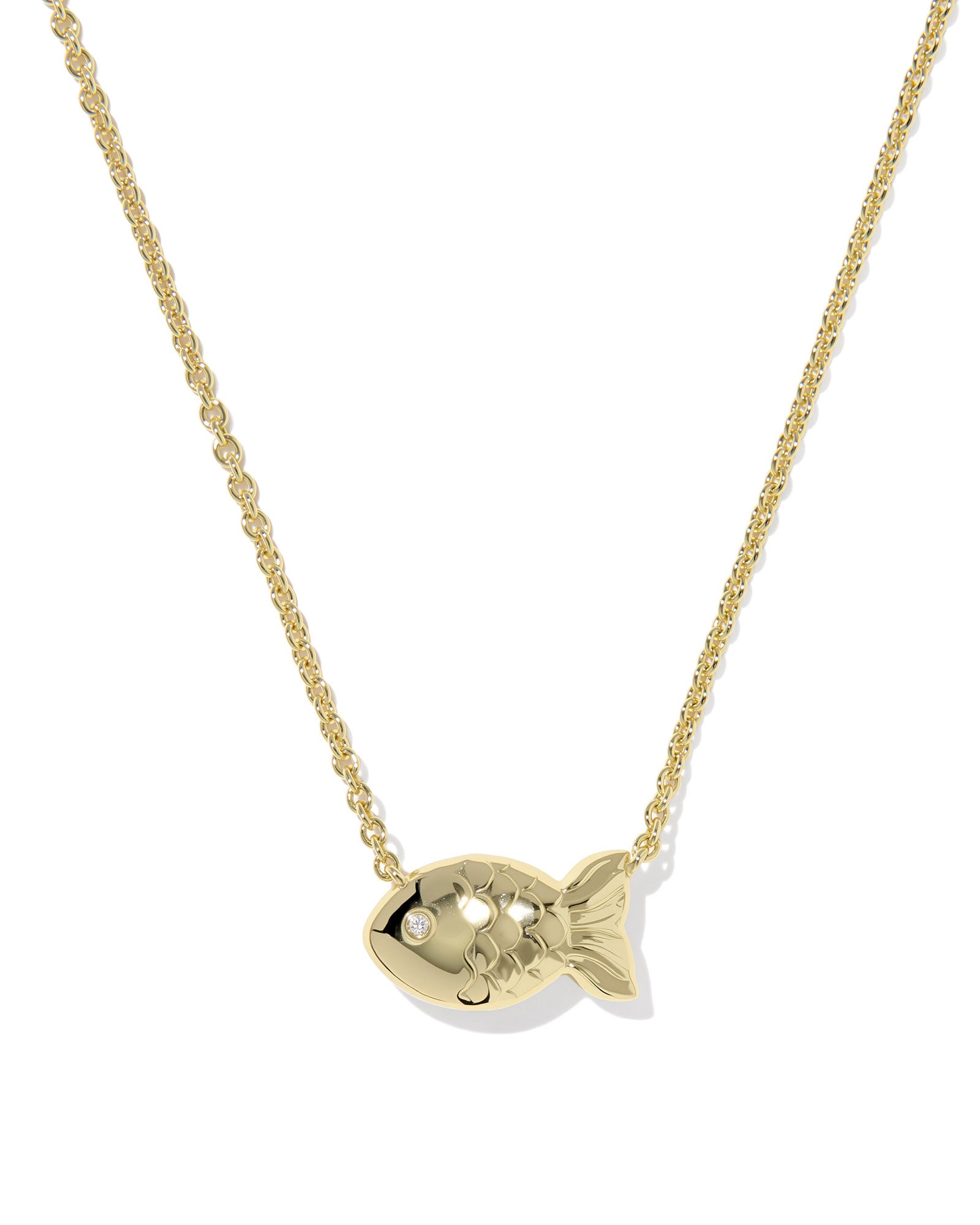 Kendra Scott Gold fish-shaped pendant on a chain against a white background