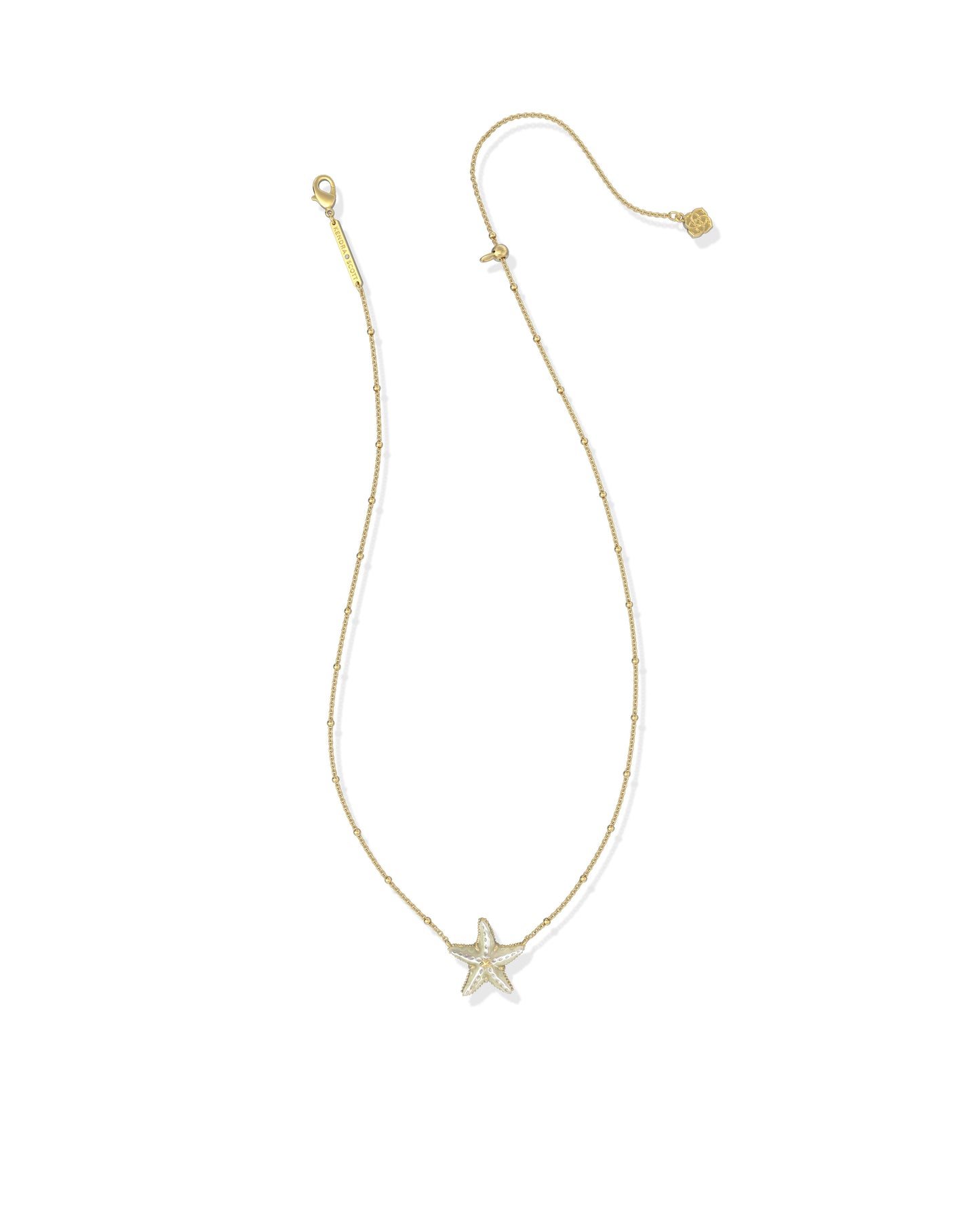 Kendra Scott Gold starfish pendant necklace on a white background