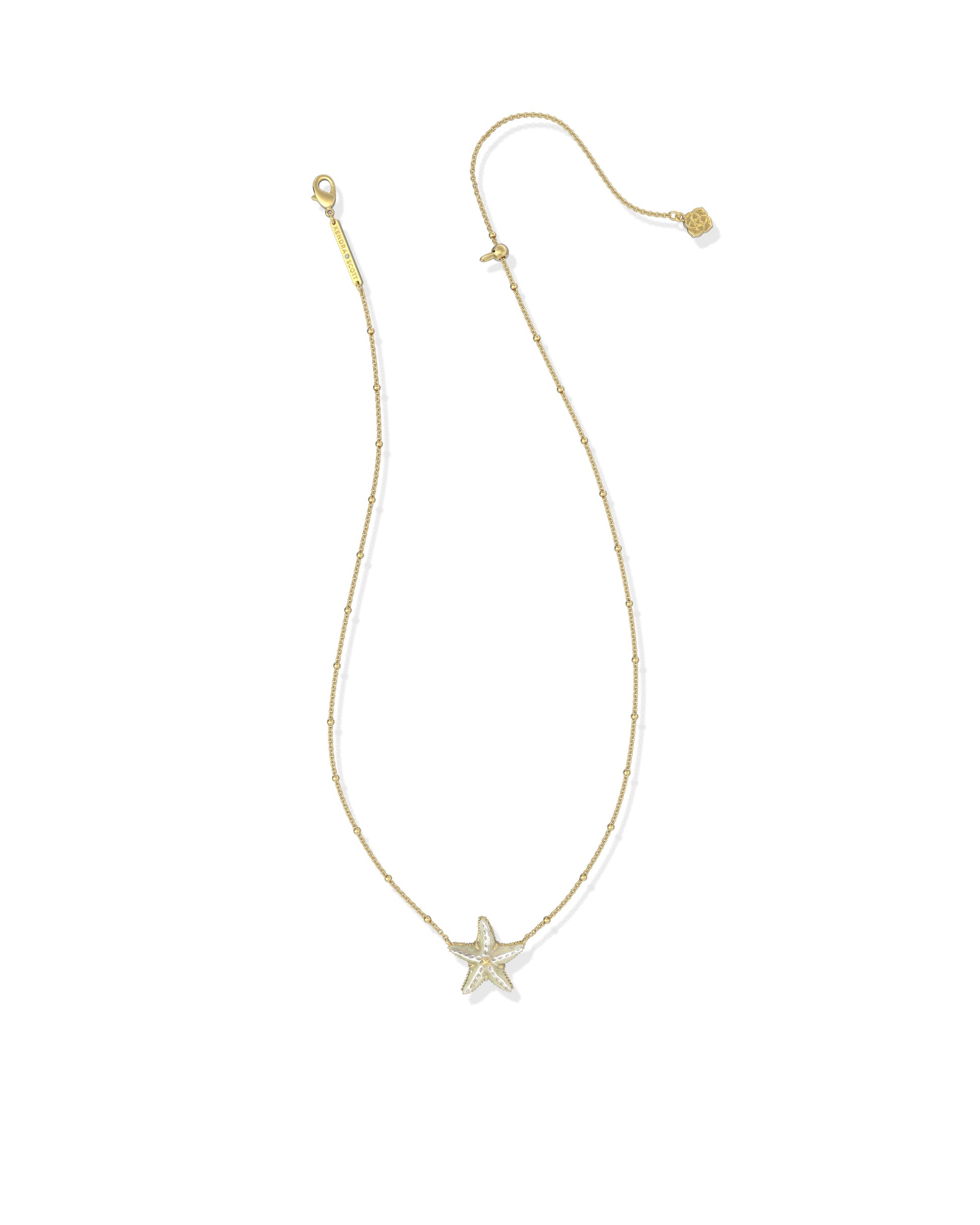 Kendra Scott Gold starfish pendant necklace on a white background