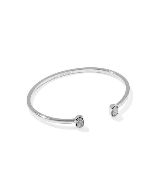 Silver bangle on a white background