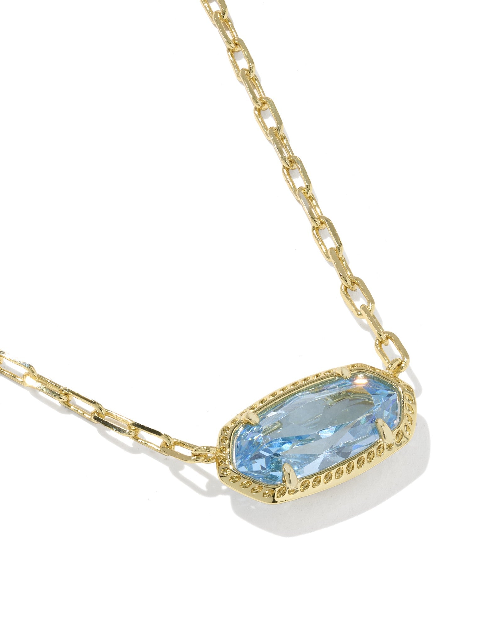 KENDRA SCOTT Elisa Gold Luxe Short Pendant Necklace in Light Blue CZ close up