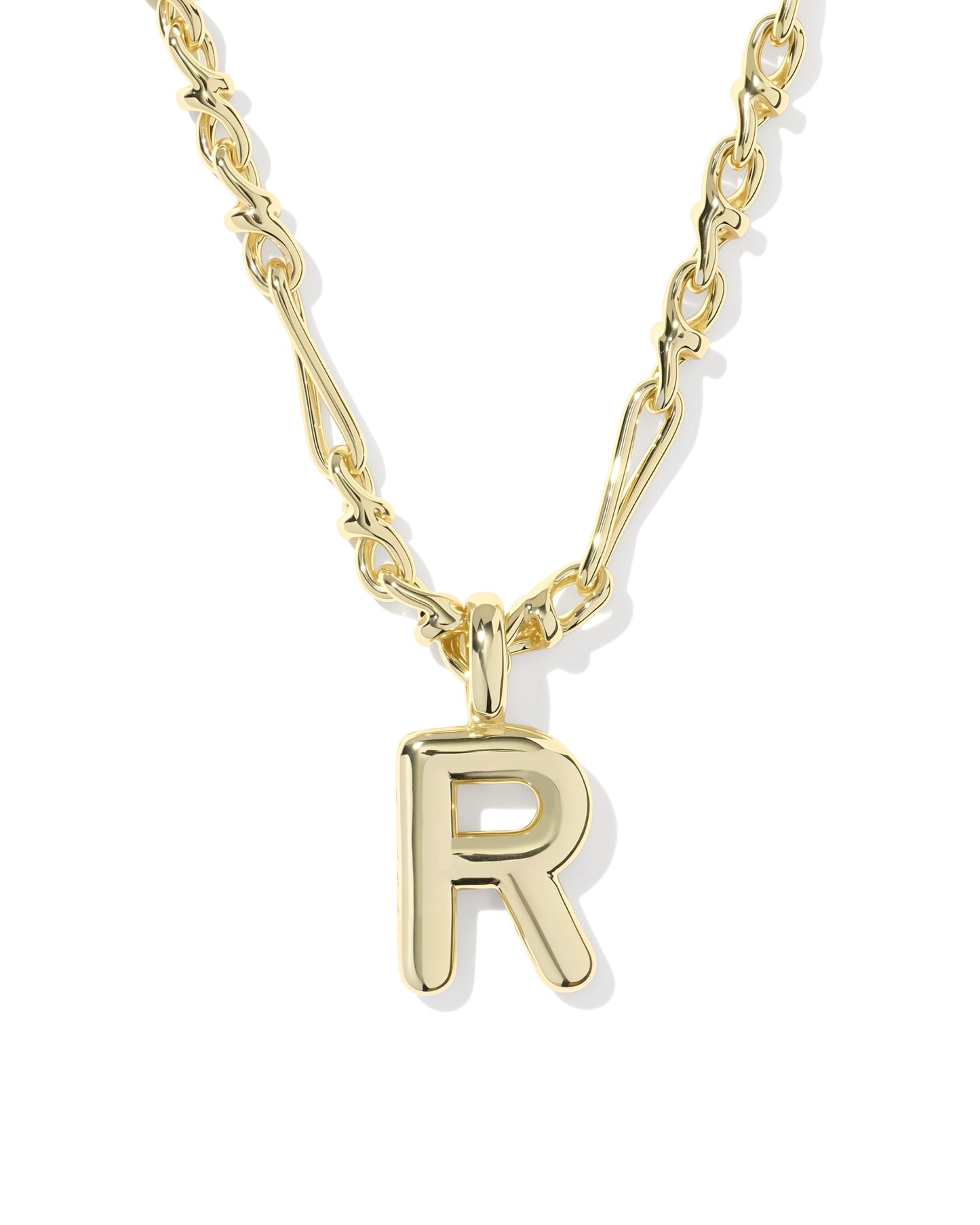 Gold necklace with a 'R' pendant on a white background