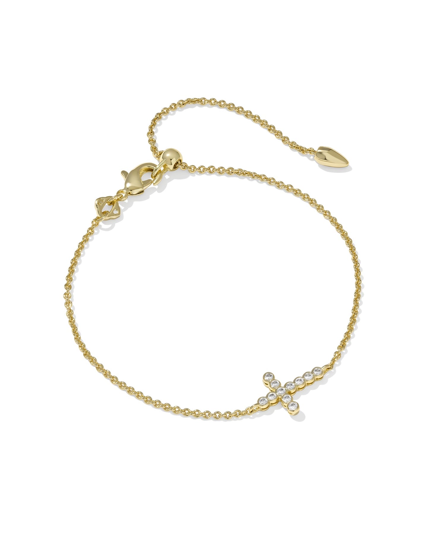 KENDRA SCOTT Gold Cross Crystal Delicate Chain Bracelet on white background