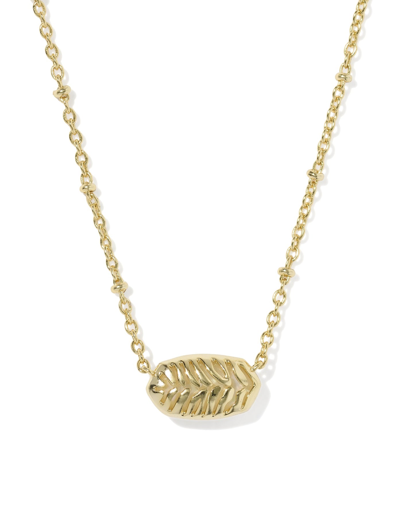 Gold necklace with a leaf-shaped pendant on a white background